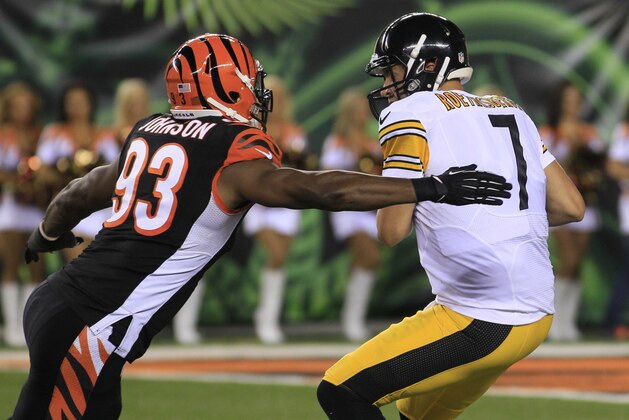 Cincinnati Bengals defensive end Michael Johnson (93) pressures Pittsburgh Steelers quarterback Ben Roethlisberger (7) in the second half of an NFL football game, Monday, Sept. 16, 2013, in Cincinnati. (AP Photo/Tom Uhlman)