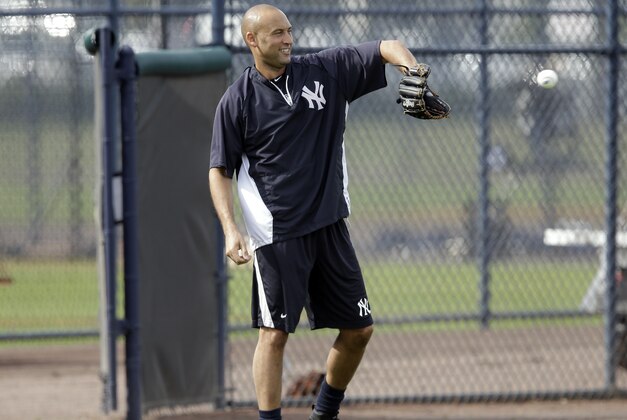 New York Yankees shortstop Derek Jeter catches a ball during practice at the Yankees' minor league facility  Wednesday, Feb. 12, 2014, in Tampa, Fla. (AP Photo/Chris O'Meara)
