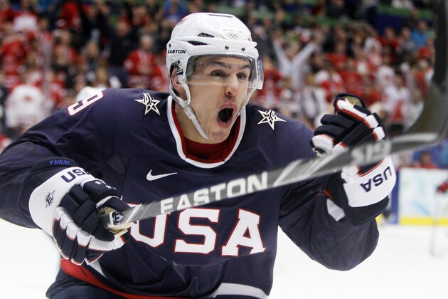 FILE - In this Feb. 28, 2010, file photo, USA's Zach Parise (9) celebrates after scoring a goal in the third period of the men's gold medal ice hockey game against Canada at the Vancouver 2010 Olympics in Vancouver, British Columbia. Parise, of the Minnesota Wild, will be the captain of the U.S. men's hockey team at the Sochi Olympics. (AP Photo/Gene J. Puskar, File)