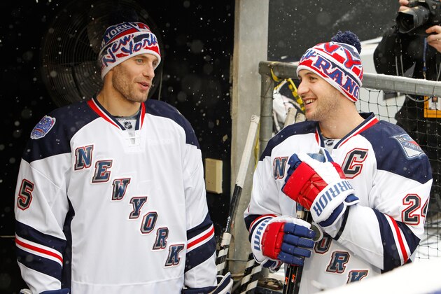 NEW YORK, NY - JANUARY 25:  Dan Girardi #5 and Ryan Callahan #24 of the New York Rangers talk in the dugout during the 2014 NHL Stadium Series practice session at Yankee Stadium on January 25, 2014 in the Bronx Borough of New York City.  (Photo by Scott Levy/NHLI via Getty Images)