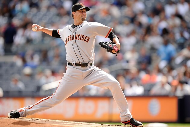 NEW YORK, NY - SEPTEMBER 21:  Ryan Vogelsong #32 of the San Francisco Giants throws a pitch during the first inning against the New York Yankees during interleague play on September 21, 2013 at Yankee Stadium in the Bronx borough of New York City.  (Photo by Maddie Meyer/Getty Images)