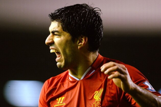LIVERPOOL, ENGLAND - JANUARY 28:  Luis Suarez of Liverpool reacts during the Barclays Premier League match between Liverpool and Everton at Anfield on January 28, 2014 in Liverpool, England.  (Photo by Laurence Griffiths/Getty Images)