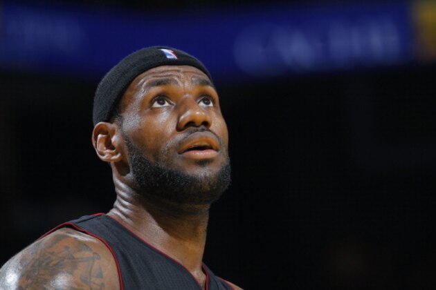 OAKLAND, CA - FEBRUARY 12: LeBron James #6 of the Miami Heat stands on the court against the Golden State Warriors on February 12, 2014 at Oracle Arena in Oakland, California. NOTE TO USER: User expressly acknowledges and agrees that, by downloading and or using this photograph, user is consenting to the terms and conditions of Getty Images License Agreement. Mandatory Copyright Notice: Copyright 2014 NBAE (Photo by Rocky Widner/NBAE via Getty Images)