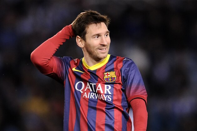 FC Barcelona's Lionel Messi of Argentina, gestures during their Spanish Copa del Rey semifinal second leg soccer match against Real Sociedad, at Anoeta stadium, in San Sebastian northern Spain, Wednesday, Feb. 12, 2014. (AP Photo/Alvaro Barrientos)