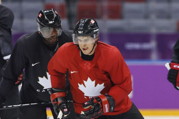 Canada forward Sidney Crosby runs through a drill during a training session at the 2014 Winter Olympics, Monday, Feb. 10, 2014, in Sochi, Russia. (AP Photo/Julie Jacobson)