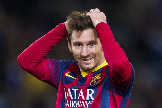 SAN SEBASTIAN, SPAIN - FEBRUARY 12:  Lionel Messi of FC Barcelona reacts during the Copa del Rey Semi-Final first leg match betweenReal Sociedad and Barcelona at Estadio Anoeta  on February 12, 2014 in San Sebastian, Spain.  (Photo by Juan Manuel Serrano Arce/Getty Images)