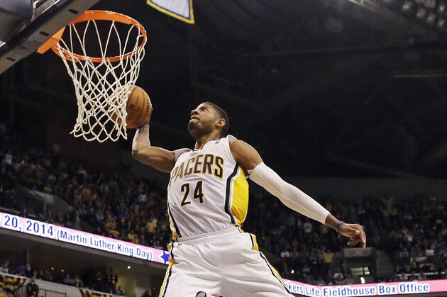 FILE - In this Jan. 18, 2014, file photo, Indiana Pacers forward Paul George (24) dunks in front of the Los Angeles Clippers Hedo Turkoglu (8) during the second half of an NBA basketball game in Indianapolis. Indiana's Paul George and Golden State's Stephen Curry could be first-time starters when the NBA announces the results of fan balloting for the All-Star game on Thursday, Jan. 23, 2013. (AP Photo/AJ Mast, File)