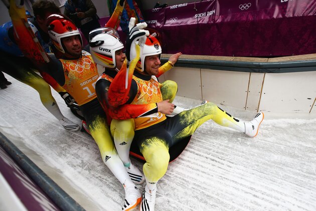 SOCHI, RUSSIA - FEBRUARY 13:  (L-R) Tobias Wendl, Natalie Geisenberger and Tobias Arlt of Germany react after a run during the Luge Relay on Day 6 of the Sochi 2014 Winter Olympics at Sliding Center Sanki on February 13, 2014 in Sochi, Russia.  (Photo by Doug Pensinger/Getty Images)