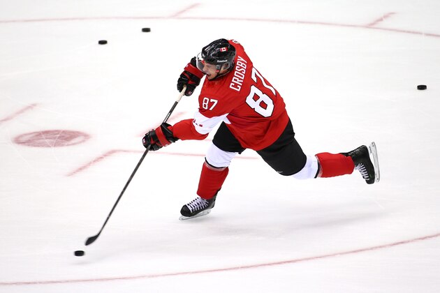 SOCHI, RUSSIA - FEBRUARY 13:  Sidney Crosby #87 of Canada takes a shot during warm-ups prior to the Men's Ice Hockey Preliminary Round Group B game against Norway on day six of the Sochi 2014 Winter Olympics at Bolshoy Ice Dome on February 13, 2014 in Sochi, Russia.  (Photo by Streeter Lecka/Getty Images)