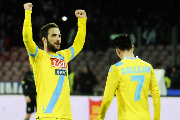 Napoli's Gonzalo Higuaín celebrates after scoring the winning goal during an Italian Cup Cup quarterfinal soccer match between Napoli and Lazio, at the San Paolo stadium in Naples, Italy, Wednesday, Jan. 29, 2014. Napoli won 1 - 0. (AP Photo/Salvatore Laporta)
