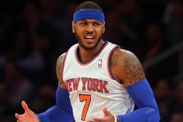 Feb 1, 2014; New York, NY, USA; New York Knicks small forward Carmelo Anthony (7) reacts after not getting a foul call against the Miami Heat during the first period of a game at Madison Square Garden. Mandatory Credit: Brad Penner-USA TODAY Sports
