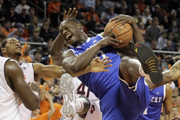 Feb 12, 2014; Auburn, AL, USA; Kentucky Wildcats forward Julius Randle (30) controls a rebound against the Auburn Tigers during the second half at Auburn Arena.  The Wildcats beat the Tigers 64-56. Mandatory Credit: John Reed-USA TODAY Sports