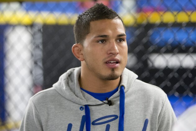 MILWAUKEE, WI - JANUARY 16:  Anthony Pettis takes an interview during Media Day at Roufusport Mixed Martial Arts Academy on January 16, 2014 in Milwaukee, Wisconsin. (Photo by Mike McGinnis/Getty Images)