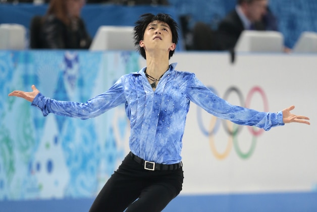 Yuzuru Hanyu of Japan competes in the men's short program figure skating competition at the Iceberg Skating Palace during the 2014 Winter Olympics, Thursday, Feb. 13, 2014, in Sochi, Russia. (AP Photo/Ivan Sekretarev)