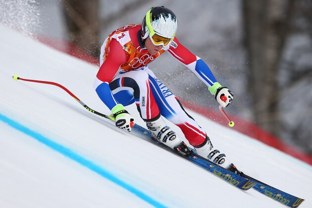 France's Alexis Pinturault makes a turn during Men's super combined downhill training at the Sochi 2014 Winter Olympics, Tuesday, Feb. 11, 2014, in Krasnaya Polyana, Russia. (AP Photo/Alessandro Trovati)