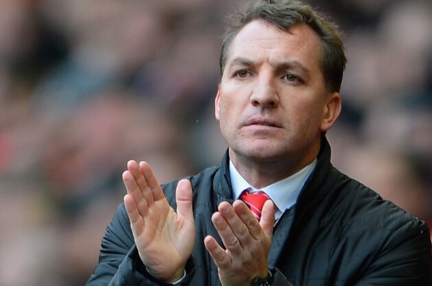 LIVERPOOL, ENGLAND - FEBRUARY 08:  Liverpool Manager Brendan Rodgers applauds during the Barclays Premier League match between Liverpool and Arsenal at Anfield on February 8, 2014 in Liverpool, England.  (Photo by Michael Regan/Getty Images)