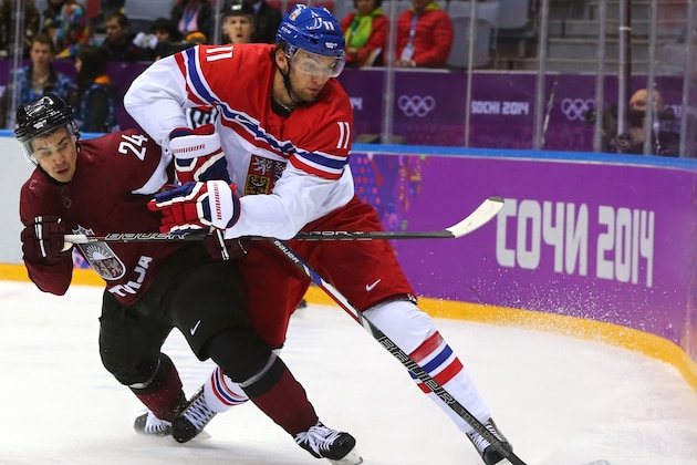SOCHI, RUSSIA - FEBRUARY 14: Martin Hanzal #11 of Czech Republic handles the puck against Mikelis Redlihs #24 of Latvia in the third period during the Men's Ice Hockey Preliminary Round Group C game on day seven of the Sochi 2014 Winter Olympics at Bolshoy Ice Dome on February 14, 2014 in Sochi, Russia. (Photo by Martin Rose/Getty Images) SOCHI, RUSSIA - FEBRUARY 14: Martin Hanzal #11 of Czech Republic handles the puck against Mikelis Redlihs #24 of Latvia in the third period during the Men's Ice Hockey Preliminary Round Group C game on day seven of the Sochi 2014 Winter Olympics at Bolshoy Ice Dome on February 14, 2014 in Sochi, Russia. (Photo by Martin Rose/Getty Images)