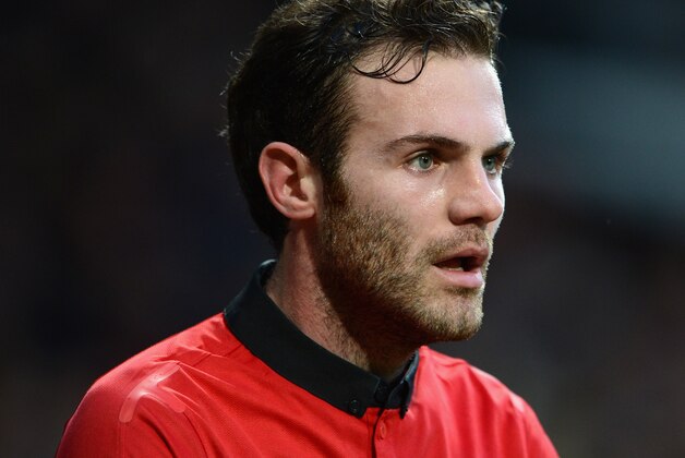 MANCHESTER, ENGLAND - FEBRUARY 09:  Juan Mata of Manchester United looks on during the Barclays Premier League match between Manchester United and Fulham at Old Trafford on February 9, 2014 in Manchester, England.  (Photo by Michael Regan/Getty Images)