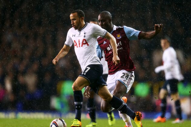 LONDON, ENGLAND - DECEMBER 18:  Andros Townsend of Tottenham Hotspur is chased by Carlton Cole of West Ham United during the Capital One Cup Quarter-Final match between Tottenham Hotspur and West Ham United at White Hart Lane on December 18, 2013 in London, England.  (Photo by Paul Gilham/Getty Images)