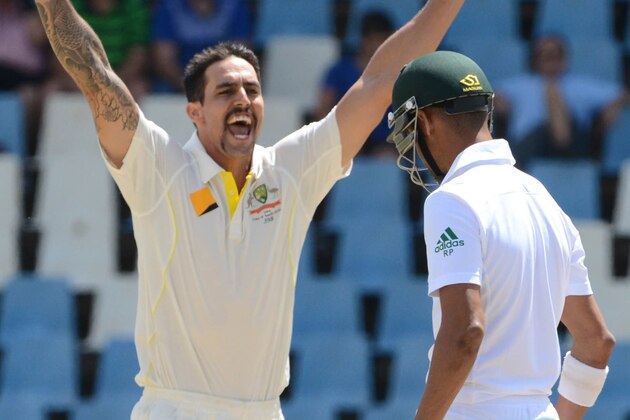 PRETORIA, SOUTH AFRICA - FEBRUARY 14: Mitchell Johnson of Australia celebrates the wicket of Robin Peterson of South Africa during day three of the First Test match between South Africa and Australia on February 14, 2014 in Centurion, South Africa.  (Photo by Morne de Klerk/Lee Warren/Gallo Images)