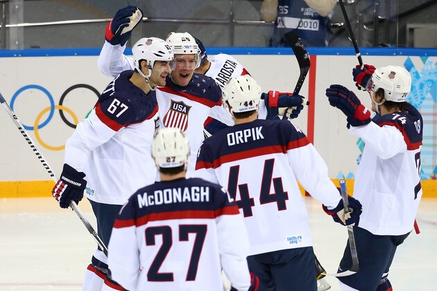 SOCHI, RUSSIA - FEBRUARY 13: Paul Stastny #26 of United States scores a celebrates with his teammates after a goal against Jaroslav Halak #41 of Slovakia during the Men's Ice Hockey Preliminary Round Group A game on day six of the Sochi 2014 Winter Olympics at Shayba Arena on February 13, 2014 in Sochi, Russia. (Photo by Streeter Lecka/Getty Images) SOCHI, RUSSIA - FEBRUARY 13: Paul Stastny #26 of United States scores a celebrates with his teammates after a goal against Jaroslav Halak #41 of Slovakia during the Men's Ice Hockey Preliminary Round Group A game on day six of the Sochi 2014 Winter Olympics at Shayba Arena on February 13, 2014 in Sochi, Russia. (Photo by Streeter Lecka/Getty Images)