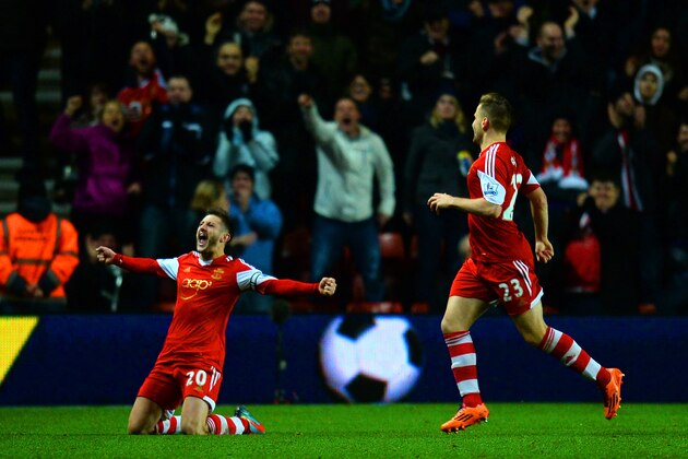 SOUTHAMPTON, ENGLAND - JANUARY 28:  Adam Lallana of Southampton celebrates scoring their second goal during the Barclays Premier League match between Southampton and Arsenal at St Mary's Stadium on January 28, 2014 in Southampton, England.  (Photo by Mike Hewitt/Getty Images)