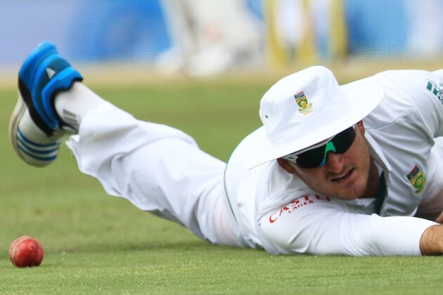 South Africa's captain Graeme Smith, looks on after dropping a catch on the third day of their their cricket Test match against Australia at Centurion Park in Pretoria, South Africa, Friday, Feb. 14, 2014. (AP Photo/ Themba Hadebe)