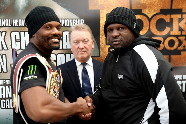 LONDON, ENGLAND - FEBRUARY 13:  American boxer Kevin Johnson (R) attends a press conference to announce his upcoming International Heavyweight bout with Great Britain's Dereck Chisora (L) on February 13, 2014 in London, England.  (Photo by Scott Heavey/Getty Images)