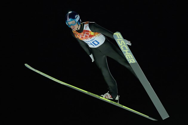 SOCHI, RUSSIA - FEBRUARY 14: Michael Hayboeck of Austria jumps during the Men's Large Hill Individual Qualification on day 7 of the Sochi 2014 Winter Olympics at the RusSki Gorki Ski Jumping Center on February 14, 2014 in Sochi, Russia.  (Photo by Adam Pretty/Getty Images)