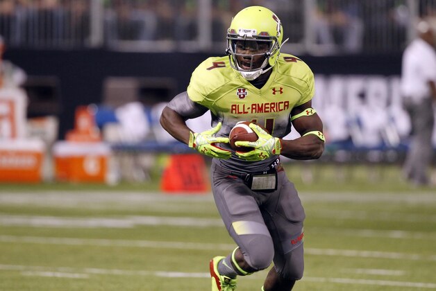 Jan 2, 2014; St. Petersburg, FL, USA; Team Nitro running back Dalvin Cook (4) runs with the ball against Team Highlight during the first half of the Under Armour All America football game at Tropicana Field. Mandatory Credit: Kim Klement-USA TODAY Sports