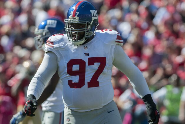 October 14, 2012; San Francisco, CA, USA; New York Giants defensive tackle Linval Joseph (97) celebrates after sacking the quarterback during the first quarter at Candlestick Park.  Mandatory Credit: Ed Szczepanski-USA TODAY Sports