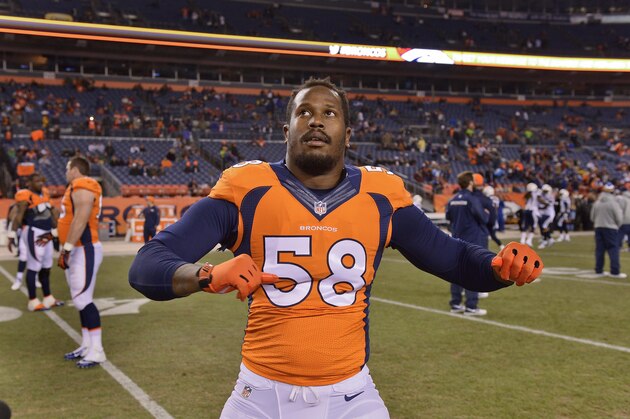 Denver Broncos outside linebacker Von Miller (58) stretches before playing against the San Diego Chargers in an NFL football game, Thursday, Dec. 12, 2013, in Denver. (AP Photo/Jack Dempsey)