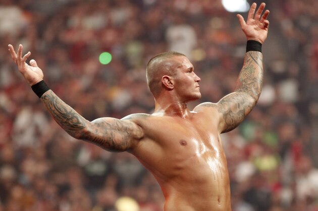 WWE Superstar Randy Orton celebrates victory during WrestleMania XXVI on March 28, 2010, at University of Phoenix Stadium in Glendale, Arizona. (AP Photo/Rick Scuteri)