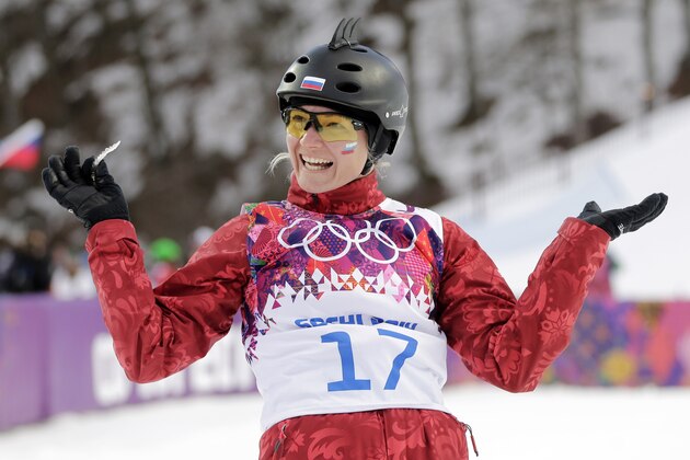 Russia's Assoli Slivets reacts after a jump during the women's freestyle skiing aerials qualifying at the Rosa Khutor Extreme Park, at the 2014 Winter Olympics, Friday, Feb. 14, 2014, in Krasnaya Polyana, Russia. (AP Photo/Andy Wong)