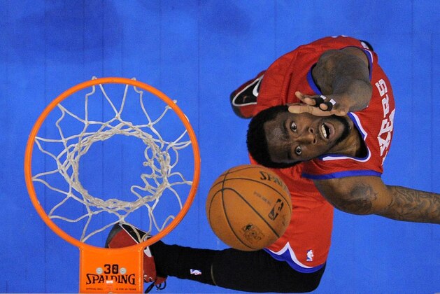 Philadelphia 76ers guard Tony Wroten shoots during the second half of an NBA basketball game against the Los Angeles Clippers, Sunday, Feb. 9, 2014, in Los Angeles. The Clippers won 123-78. (AP Photo/Mark J. Terrill)