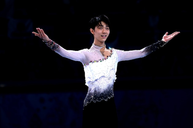 SOCHI, RUSSIA - FEBRUARY 14:  Yuzuru Hanyu of Japan celebrates after winning the gold medal in the Figure Skating Men's Free Skating on day seven of the Sochi 2014 Winter Olympics at Iceberg Skating Palace on February 14, 2014 in Sochi, Russia.  (Photo by Matthew Stockman/Getty Images)