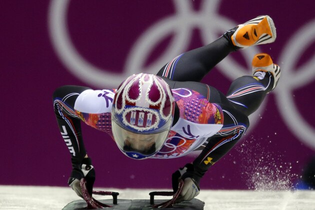 Noelle Pikus-Pace of the United States starts her final run during the women's skeleton competition at the 2014 Winter Olympics, Friday, Feb. 14, 2014, in Krasnaya Polyana, Russia. Pikus-Pace won the silver medal. (AP Photo/Natacha Pisarenko)
