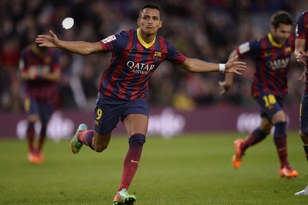 FC Barcelona's Alexis Sanchez, from Chile, reacts after scoring against Elche during a Spanish La Liga soccer match at the Camp Nou stadium in Barcelona, Spain, Sunday, Jan 5, 2014. (AP Photo/Manu Fernandez)