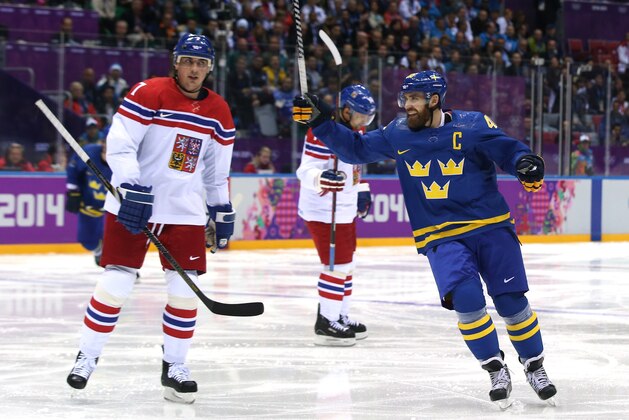 SOCHI, RUSSIA - FEBRUARY 12:  Henrik Zetterberg #40 of Sweden celebrates a goal in the second period against Jakub Kovar #1 of Czech Republic during the Men's Ice Hockey Preliminary Round Group C game on day five of the Sochi 2014 Winter Olympics at Bolshoy Ice Dome on February 12, 2014 in Sochi, Russia.  (Photo by Bruce Bennett/Getty Images)
