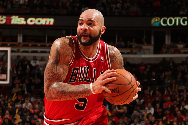 CHICAGO, IL - FEBRUARY 13: Carlos Boozer #5 of the Chicago Bulls drives during the game against the Brooklyn Nets on February 13, 2014 at the United Center in Chicago, Illinois. NOTE TO USER: User expressly acknowledges and agrees that, by downloading and/or using this photograph, user is consenting to the terms and conditions of the Getty Images License Agreement.  Mandatory Copyright Notice: Copyright 2014 NBAE (Photo by Ray Amati/NBAE via Getty Images)