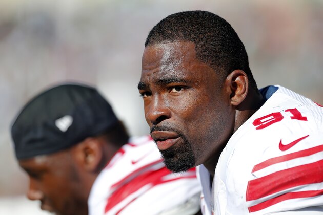 PHILADELPHIA, PA - OCTOBER 27: Defensive end Justin Tuck #91 looks on from the bench during the fourth quarter against the Philadelphia Eagles in a game at Lincoln Financial Field on October 27, 2013 in Philadelphia, Pennsylvania. The Giants defeated the Eagles 15-7. (Photo by Rich Schultz /Getty Images)