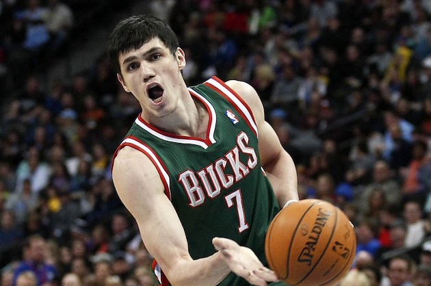Feb 5, 2014; Denver, CO, USA; Milwaukee Bucks power forward Ersan Ilyasova (7) passes the ball in the second quarter against the Denver Nuggets at the Pepsi Center. Mandatory Credit: Isaiah J. Downing-USA TODAY Sports