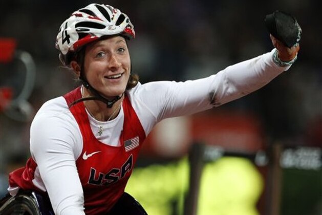 Tatyana McFadden of the US celebrates her victory in the Women's 800m T54 Final at the 2012 Paralympics in London, Wednesday, Sept. 5, 2012. (AP Photo/Emilio Morenatti)