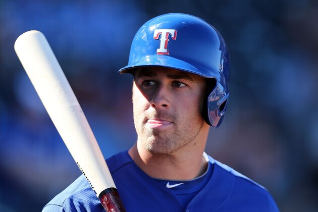 SURPRISE, AZ - FEBRUARY 22:  Mike Olt #9 of the Texas Rangers warms up on deck during the spring training game against the Kansas City Royals at Surprise Stadium on February 22, 2013 in Surprise, Arizona.  (Photo by Christian Petersen/Getty Images)