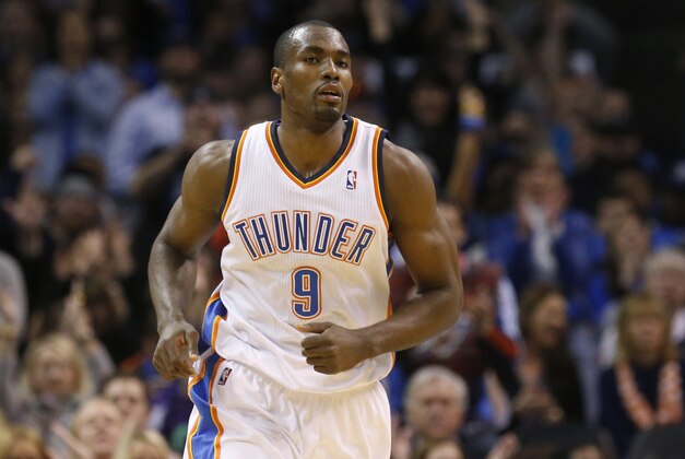 Oklahoma City Thunder forward Serge Ibaka (9) runs up the court during an NBA basketball game against the Sacramento Kings in Oklahoma City, Sunday, Jan. 19, 2014. Oklahoma City won 108-93.(AP Photo/Sue Ogrocki)