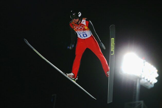 SOCHI, RUSSIA - FEBRUARY 09: Peter Frenette of the United States jumps during the Men's Normal Hill Individual on day 2 of the Sochi 2014 Winter Olympics at the RusSki Gorki Ski Jumping Center on February 9, 2014 in Sochi, Russia.  (Photo by Julian Finney/Getty Images)
