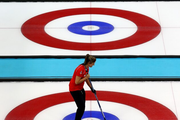 SOCHI, RUSSIA - FEBRUARY 14:  Vicki Adams of Great Britain competes against Japan during the Women's Curling Round Robin match on day seven of the Sochi 2014 Winter Olympics at Ice Cube Curling Center on February 14, 2014 in Sochi, Russia.  (Photo by Streeter Lecka/Getty Images)