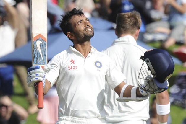 India’s Ajinkya Rahane celebrates his first test century against New Zealand on the second day of the second cricket test in Wellington, New Zealand, Saturday, Feb. 15, 2014. (AP Photo/SNPA, Ross Setford) NEW ZEALAND OUT