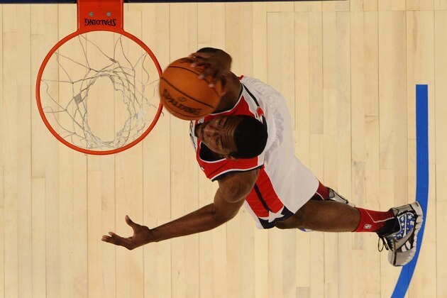Team Chuck, Washington Wizards' John Wall dunks the ball during the NBA All Star BBVA Rising Stars Challenge basketball game in Orlando, Fla. Friday, Feb. 24, 2012. (AP Photo/Gary Bogdon, Pool)
