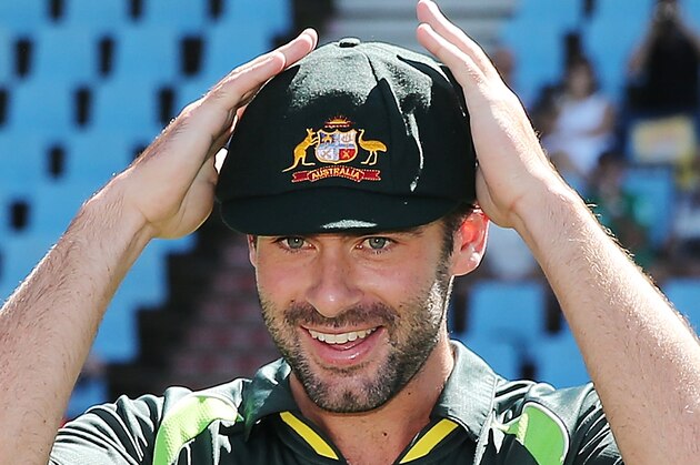 CENTURION, SOUTH AFRICA - FEBRUARY 12:  Alex Doolan of Australia is congratulated by teammates after receiving his cap before day one of the First Test match between South Africa and Australia on February 12, 2014 in Centurion, South Africa.  (Photo by Morne de Klerk/Getty Images)